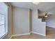 Bright dining area featuring a large window and wood-look flooring at 698 S Racetrack Rd # 114, Henderson, NV 89015