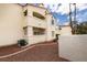 Multi-level condo building with red tile roof and private balconies at 698 S Racetrack Rd # 114, Henderson, NV 89015