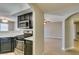 Bright kitchen features stainless appliances, a gas range, and stylish white countertops at 698 S Racetrack Rd # 114, Henderson, NV 89015