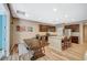 Bright eat-in kitchen features stainless steel appliances and a dining table with a bench at 7035 Chestnut Valley St, Las Vegas, NV 89166