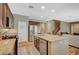 Kitchen with stainless steel appliances and an island at 7035 Chestnut Valley St, Las Vegas, NV 89166