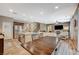 Bright open concept living space with adjacent eat-in kitchen for easy entertaining at 7035 Chestnut Valley St, Las Vegas, NV 89166