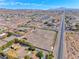 Horse property featuring stables, an arena, and abundant space at 728 N Kiel St, Henderson, NV 89015