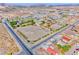 Expansive horse property featuring an arena, stables, and desert landscape in a rural setting at 728 N Kiel St, Henderson, NV 89015