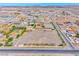 Extensive horse property showcasing a large arena, stables, and desert surroundings at 728 N Kiel St, Henderson, NV 89015