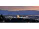 City night view showing the bright lights of the city below a mountain range at 728 N Kiel St, Henderson, NV 89015