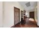 Entryway features a hard wood floor and trim, with a built-in display case at 728 N Kiel St, Henderson, NV 89015