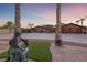 Charming home with manicured lawn and stone accents, complemented by mature palm trees at 728 N Kiel St, Henderson, NV 89015