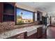 A bright kitchen sink and large window with counter space at 728 N Kiel St, Henderson, NV 89015