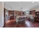 Spacious kitchen featuring stainless steel appliances, a stone oven arch and a large island with bar stool seating at 728 N Kiel St, Henderson, NV 89015