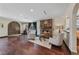 Inviting living room features a stone fireplace, wood floors, and elegant decor at 728 N Kiel St, Henderson, NV 89015