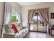 Cozy living room with comfortable seating and a view of the outdoors through a sliding glass door at 728 N Kiel St, Henderson, NV 89015