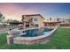 Exterior features a swimming pool, covered patio, built-in spa, and mature landscaping at 728 N Kiel St, Henderson, NV 89015