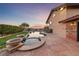 Exterior features a swimming pool, spa, and well manicured landscaping at 728 N Kiel St, Henderson, NV 89015