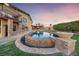 Exterior features a swimming pool and multiple levels of outdoor entertainment space at 728 N Kiel St, Henderson, NV 89015