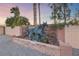 Bronze horse statue set in front of a stone wall and beautiful landscaping at 728 N Kiel St, Henderson, NV 89015