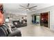 Open-concept living space with living, dining, and kitchen areas with modern decor at 731 Glowing Horizon St, Henderson, NV 89052