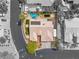 Aerial view of a home showing the private pool, well-manicured yard, and surrounding neighborhood at 7401 Bridlehorne Ave, Las Vegas, NV 89131