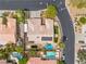 Aerial view showcasing private backyard pool, RV parking and tile roof at 7401 Bridlehorne Ave, Las Vegas, NV 89131