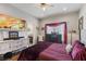 Cozy bedroom featuring a ceiling fan and a TV for relaxed evenings at 7401 Bridlehorne Ave, Las Vegas, NV 89131