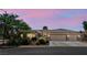 Charming single story home featuring desert landscaping and three car garage at 7401 Bridlehorne Ave, Las Vegas, NV 89131