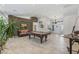 Large game room featuring a pool table, comfortable seating, and artwork adorning the walls at 7401 Bridlehorne Ave, Las Vegas, NV 89131