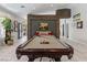 Large game room with a billiard table, stylish decor, and ample space for entertaining at 7401 Bridlehorne Ave, Las Vegas, NV 89131