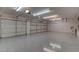Spacious three car garage with sealed concrete floors and automatic door openers at 7401 Bridlehorne Ave, Las Vegas, NV 89131