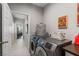 Hallway laundry area with gray washer and dryer set at 7401 Bridlehorne Ave, Las Vegas, NV 89131