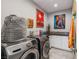 Laundry room featuring front load washer and dryer at 7401 Bridlehorne Ave, Las Vegas, NV 89131