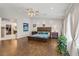 Spacious main bedroom with hardwood floors and ensuite bathroom at 7401 Bridlehorne Ave, Las Vegas, NV 89131