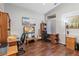 Cozy office space with wood floors, natural light, and dedicated desks at 7401 Bridlehorne Ave, Las Vegas, NV 89131