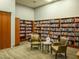 A library featuring rows of bookshelves and seating areas for reading and relaxation at 7668 Broadwing Dr, North Las Vegas, NV 89084