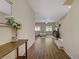 Inviting entryway with hardwood floors leading into a bright and spacious living area at 776 Flowing Meadow Dr, Henderson, NV 89014