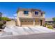 Beautiful two-story home with a three-car garage, and an extra long driveway at 776 Flowing Meadow Dr, Henderson, NV 89014