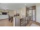 Spacious kitchen boasts stainless steel appliances, granite counters, and dark wood cabinets with an eat in area at 776 Flowing Meadow Dr, Henderson, NV 89014