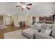 Spacious living room showcasing an open layout with the kitchen and dining area visible at 776 Flowing Meadow Dr, Henderson, NV 89014