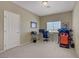 Carpeted office space offering a dual monitor setup and an ergonomic chair at 776 Flowing Meadow Dr, Henderson, NV 89014