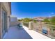 Enjoy mountain views from this spacious outdoor patio with stylish chairs and a table at 776 Flowing Meadow Dr, Henderson, NV 89014