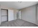 Bedroom featuring carpet, neutral walls, and a double door closet at 8028 Hurricane Cove Ct, Las Vegas, NV 89129