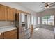 Kitchen with stainless steel refrigerator and eat in breakfast nook area with lots of natural light at 8028 Hurricane Cove Ct, Las Vegas, NV 89129