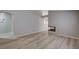 Bright living room with hardwood floors and fireplace at 8028 Hurricane Cove Ct, Las Vegas, NV 89129