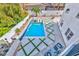 Aerial view of pool, spa and outdoor living space in backyard at 8133 Desert Jewel Cir, Las Vegas, NV 89128
