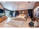 Spacious primary bedroom featuring a platform bed, modern decor, and ample natural light at 8133 Desert Jewel Cir, Las Vegas, NV 89128
