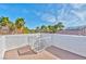 Expansive rooftop deck with views of palm trees and the neighborhood at 8133 Desert Jewel Cir, Las Vegas, NV 89128