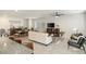 Spacious living room connected to dining area, featuring stylish furnishings, neutral tones, and abundant natural light at 8316 Gold River Ct, Las Vegas, NV 89113
