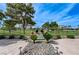 Beautiful backyard with a stone water feature and golf course view at 8340 Carmel Ridge Ct, Las Vegas, NV 89113