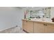Hallway with custom cabinets and decorative accents on the counter at 8340 Carmel Ridge Ct, Las Vegas, NV 89113