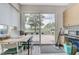 Bright breakfast area featuring a table, lots of light and access to the outdoor patio at 8340 Carmel Ridge Ct, Las Vegas, NV 89113