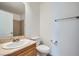 Powder room features a single sink, granite countertop, and modern fixtures at 8431 Jeremiah Grove St, Las Vegas, NV 89123
